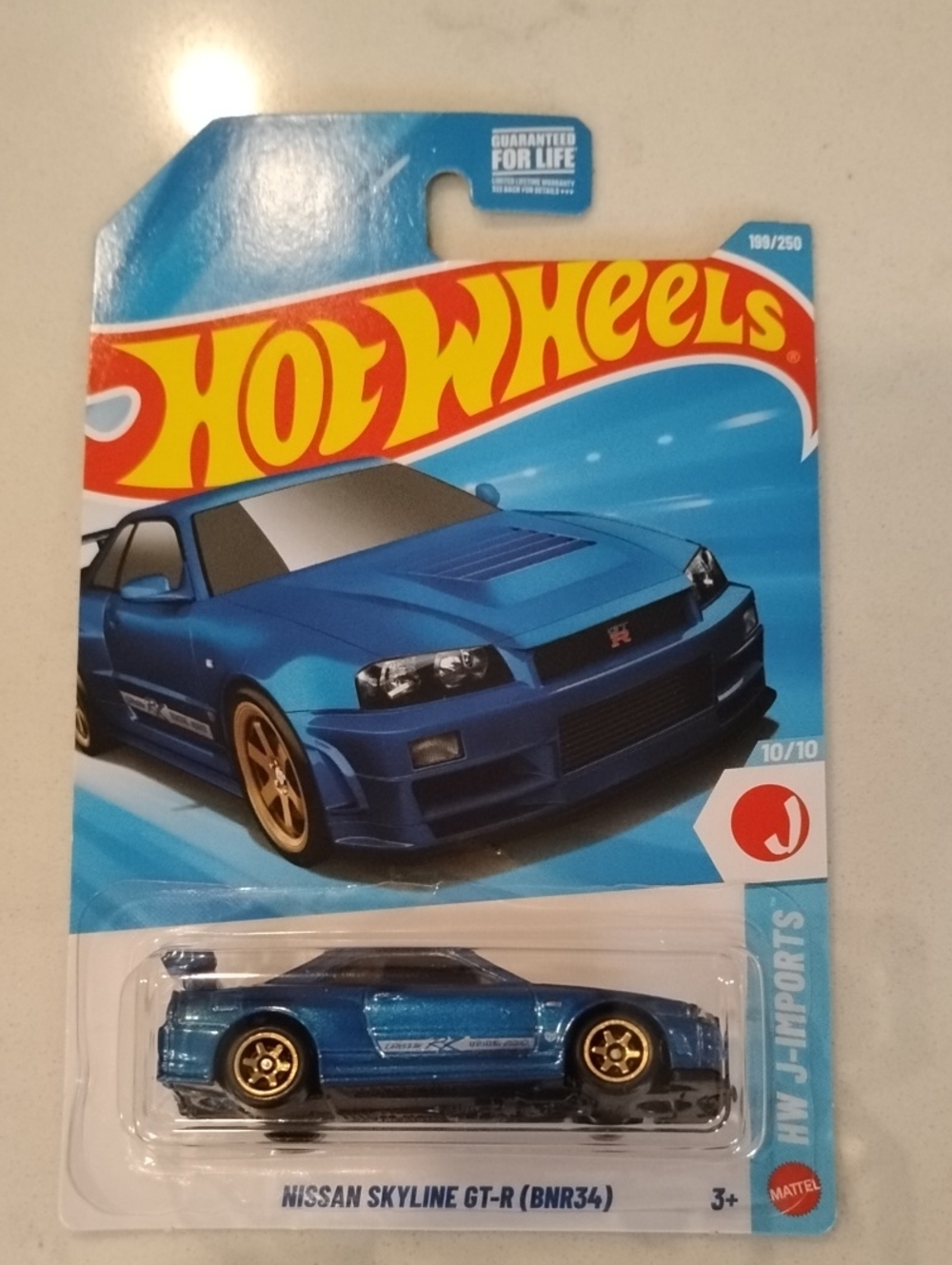 Mattel Hot Wheels Nissan Skyline GT-R (BNR34) - Blue with Gold Wheels